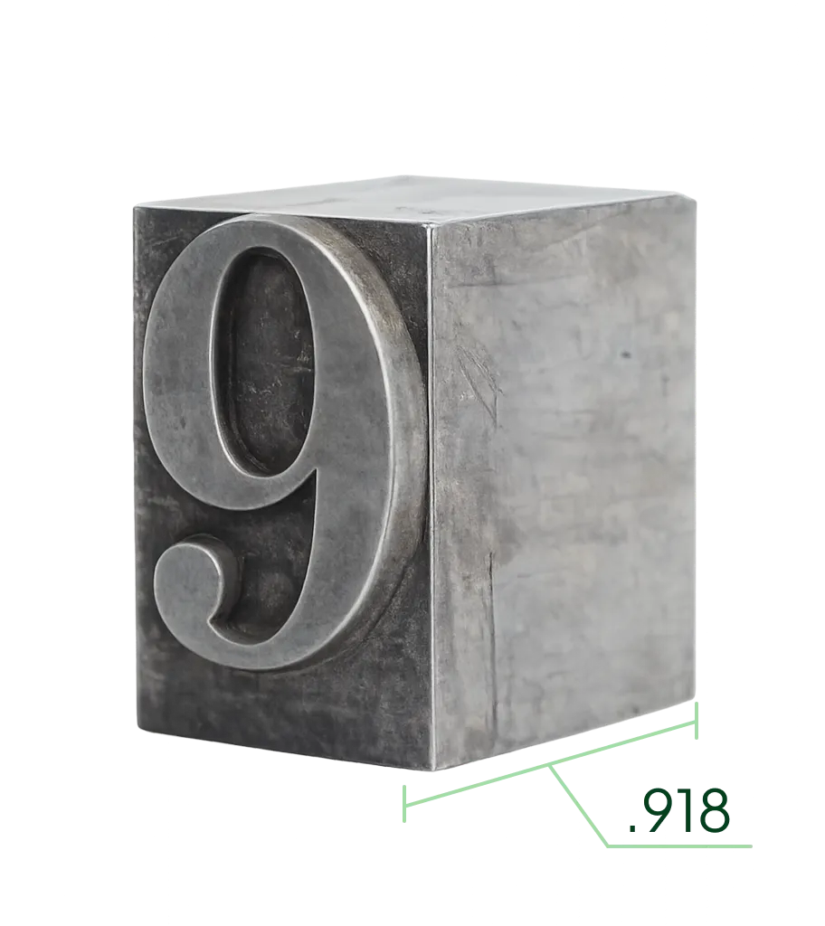 Lead type block with the number 9 — the origin of 918 Studio's name