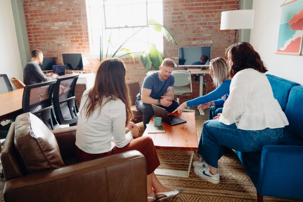 918 Studio team collaborating in a modern office